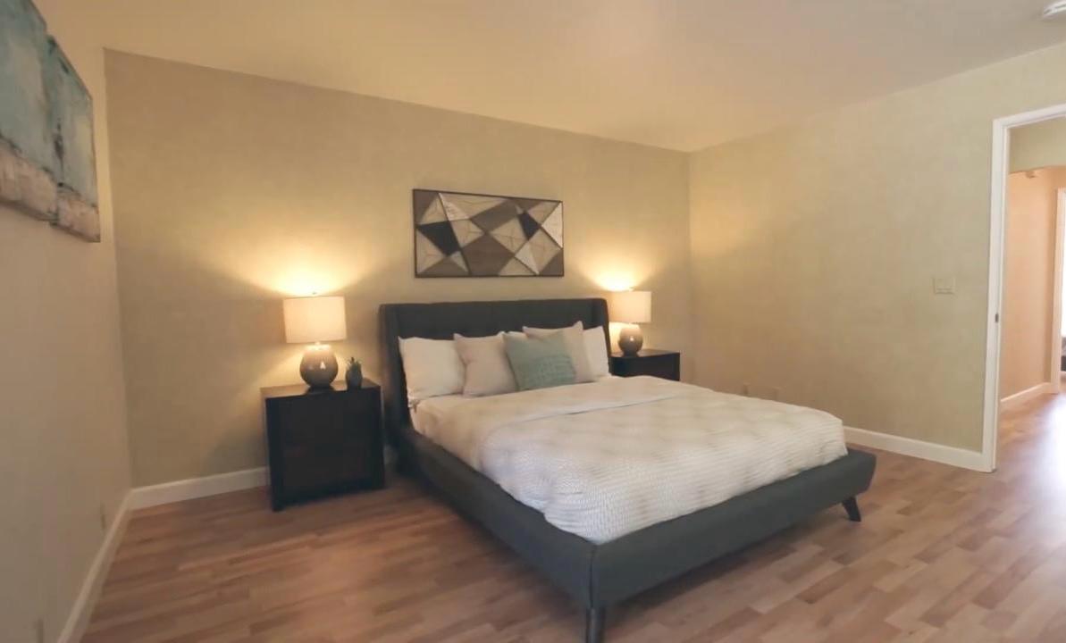 Before bedroom on Central Ave in Mountain View with existing flooring prior to wide-plank floating vinyl flooring installation