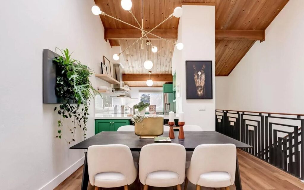 Central Ave home in Mountain View with dining area, wood ceiling with exposed beams, modern metal stair railing, and open shelving