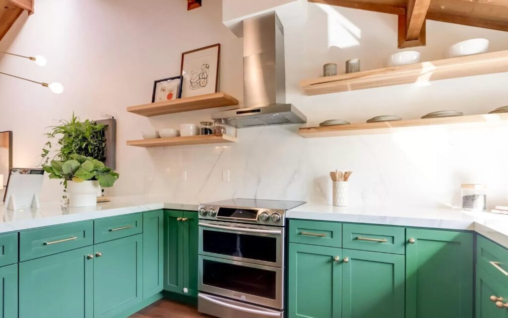 San Jose kitchen remodel featuring bold green cabinetry with natural wood open shelving and contemporary design elements